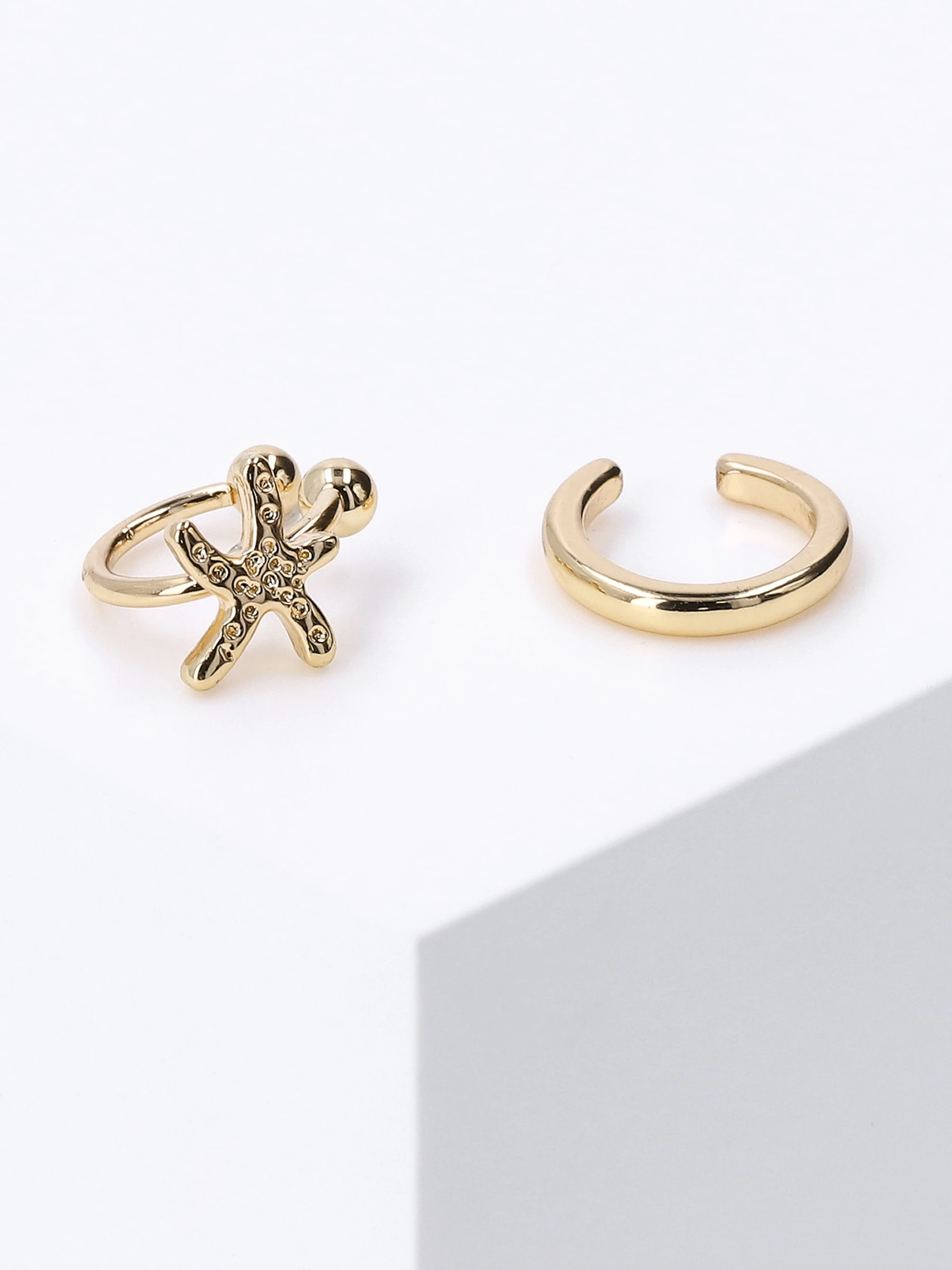 Accessories Goldfarbenes Earcuff-Set Mit Seestern-Motiv 4 Accessories Goldfarbenes Earcuff-Set Mit Seestern-Motiv – Bild 2